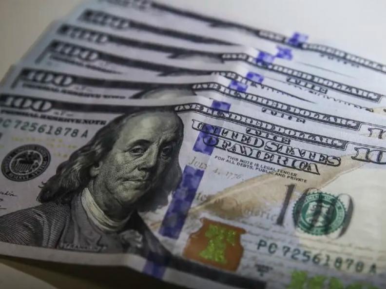 Dólar cai para R$ 6,04 em dia de posse de Trump